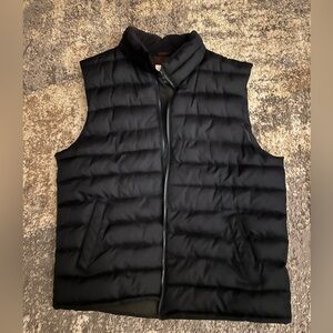 Old navy blackk puffer vest.  Wore a couple times. Like new.